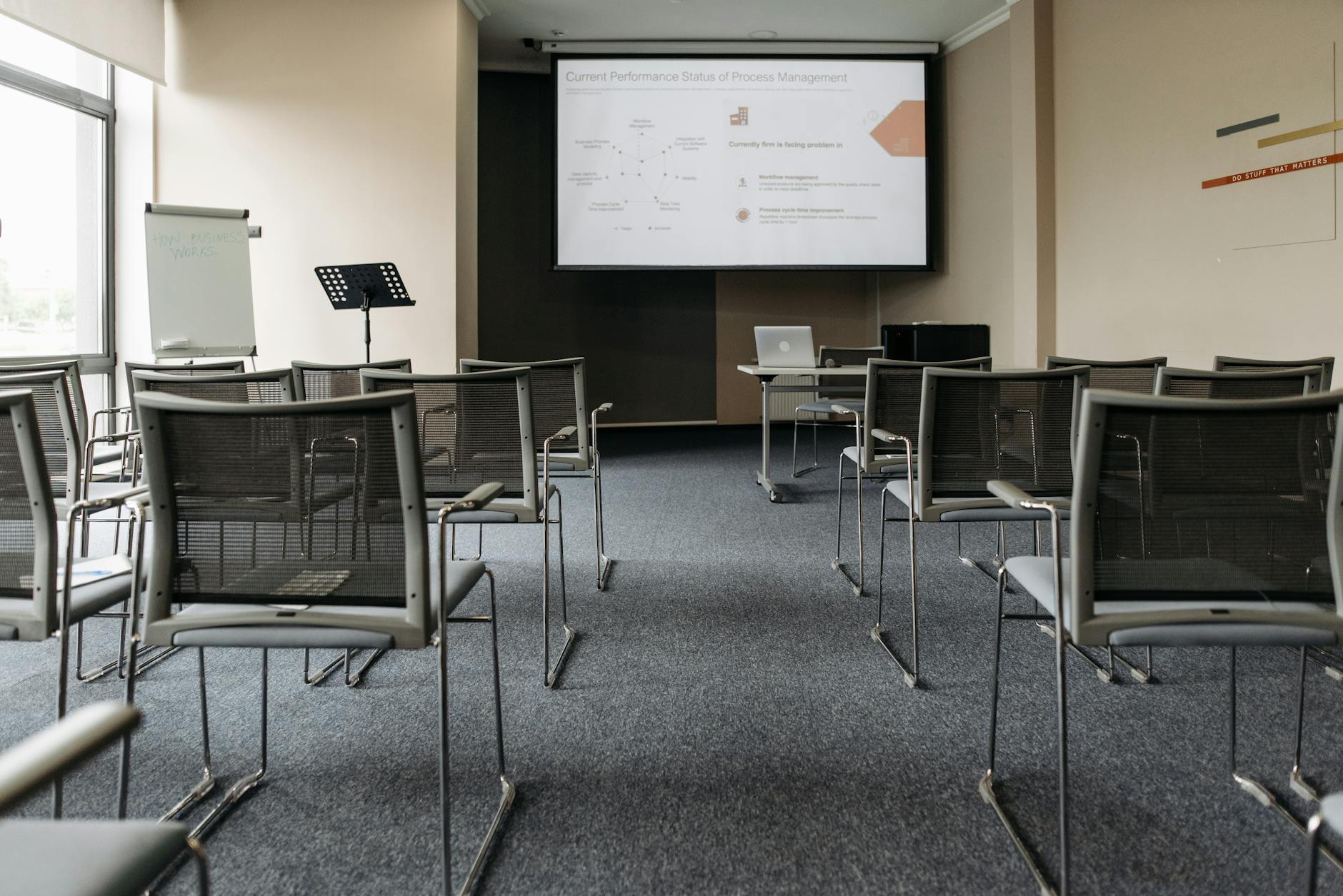 white projector screen on white wall